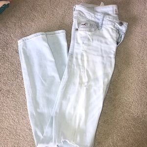 Light wash jeans with holes